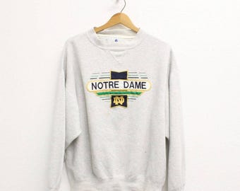 Vintage Notre Dame Fighting Irish Sweatshirt aus den 90er Jahren, grauer University College Rundhalsausschnitt, Größe L