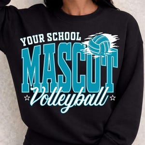 May include: A black long-sleeve sweatshirt featuring a graphic design with the text YOUR SCHOOL MASCUT Volleyball in white and teal. The design includes a stylized teal volleyball graphic with white brushstroke accents and two small white stars.