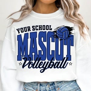 May include: A white crewneck sweatshirt featuring a graphic print in blue and black. The text reads YOUR SCHOOL MASCOT Volleyball, accompanied by a blue volleyball illustration. The design is centered on the chest of the long-sleeved garment.