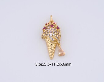 May include: Gold-tone ice cream cone charm with pink and white cubic zirconia stones and a single clear stone hanging from the bottom. Size: 27.5x11.5x5.6mm