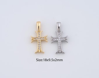 May include: Two pendant crosses, one gold-toned and one silver-toned, each adorned with small, sparkling stones. The gold cross is on the left, and the silver cross is on the right. The size is 18x9.5x2mm.