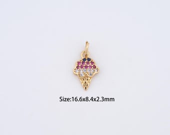 May include: Gold-colored ice cream cone charm with a loop for hanging. The ice cream is adorned with red, white, and blue gemstones. The cone has a textured design. The charm measures 16.6mm x 8.4mm x 2.3mm.