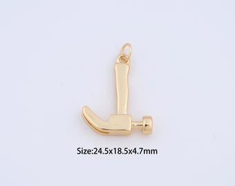 May include: A gold-colored hammer pendant with a loop at the top for hanging. The hammer head is curved, and the handle is straight. The dimensions are 24.5 x 18.5 x 4.7 mm.