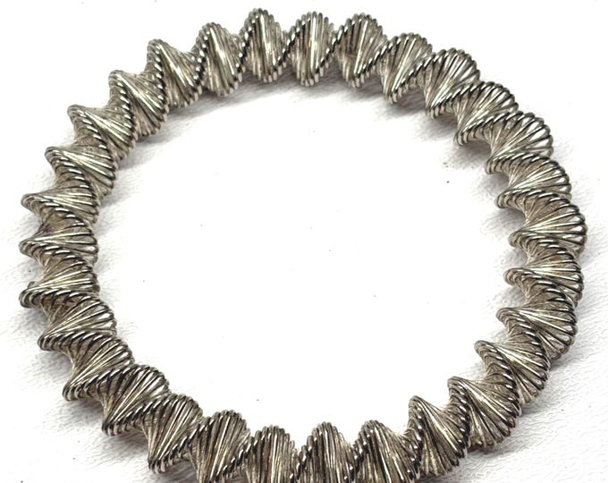 Carolyn Forsman design for MoMA NYC: Silver-plated spring steel Double Helix DNA stretch bracelet 1990s collectible art jewelry