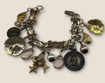 Ocean-themed gold tone OOAK Charm bracelet upcycled/reworked with vintage charms, shells & pearls on vintage link chain 7.5”