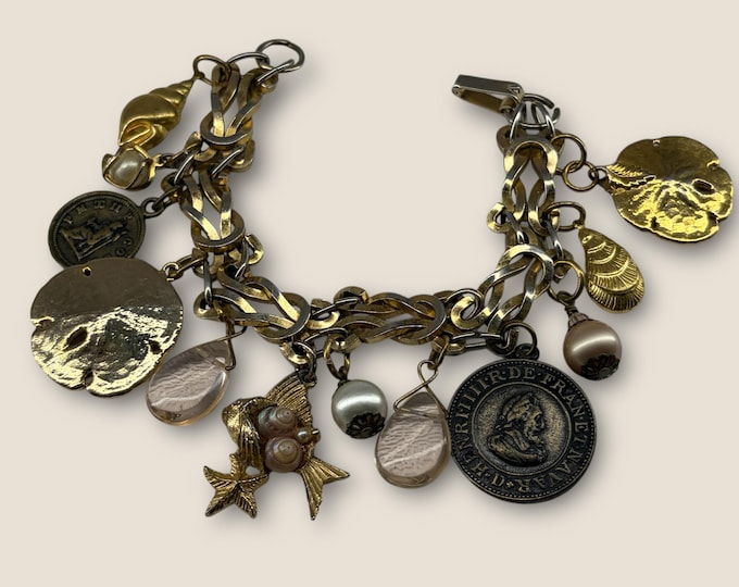Ocean-themed gold tone OOAK Charm bracelet upcycled/reworked with vintage charms, shells & pearls on vintage link chain 7.5”