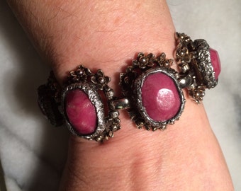 Selro-style upcycled vintage bracelet with luminous hand-faceted raspberry cabochons