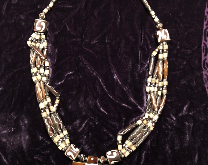 vintage tribal-style Tibetan multi-strand necklace with resin shield pendant, Yak bone beads