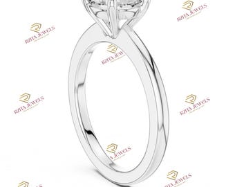 May include: A solitaire engagement ring with a round brilliant cut diamond set in a four-prong setting. The ring has a simple, elegant band.