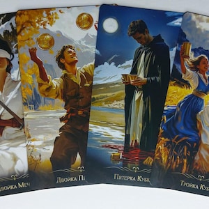 May include: Four tarot cards featuring illustrations of figures in various scenes. One card shows a blindfolded person with crossed swords. Another depicts a man juggling coins. The third card shows a person in a cloak. The last card shows three people raising cups.