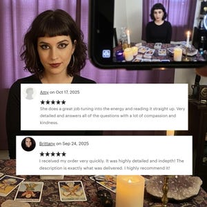 May include: A woman with dark hair and a black top is holding a phone displaying a tarot reading. The phone shows a table with tarot cards, candles, and another woman. Two customer reviews are visible.