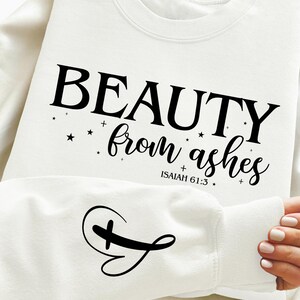 May include: White sweatshirt with the text "BEAUTY from ashes" and the scripture reference "ISAIAH 61:3".