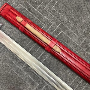 roman demascu steel sword with wooden handle aned wooden scaberd on leather