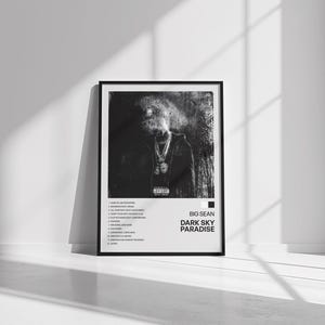 May include: Black and white album cover art featuring a person with a microphone. The album title is "Dark Sky Paradise" by Big Sean.