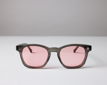 New York Eye_rish, Castlerock. Smoky Grey Frame with Pink Lenses