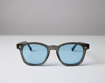 New York Eye_rish, Castlerock. Smoky Grey Frame with Blue Lenses