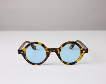 New York Eye_rish, Greystones. Light Tortoise Shell Frame with Blue Lenses