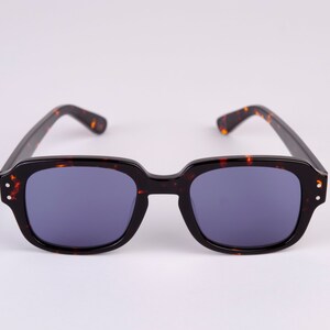 Large New York Eye_rish, The Downings. Dark Brown Tortoise Shell Frame with Blue Lenses image 1