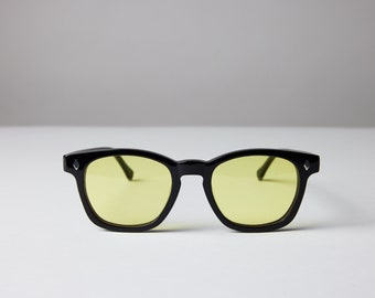 New York Eye_rish, Castlerock. Black Frame with Yellow Lenses