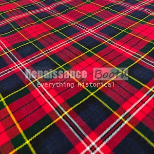 Peut inclure: Gros plan sur un tissu à carreaux rouge, noir, vert, jaune et blanc. Le tissu présente un motif diagonal avec des lignes qui se croisent. Le texte "Renaissance Booth Everything Historical" est visible.