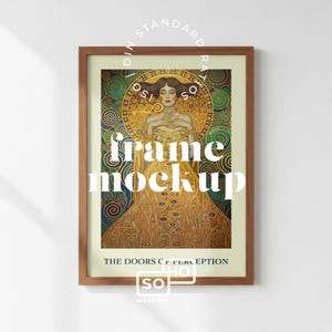 May include: A framed art print depicting a woman in a gold dress, set against a backdrop of swirling green and gold patterns. The print is in a brown wooden frame, with the text "THE DOORS OF PERCEPTION" at the bottom.