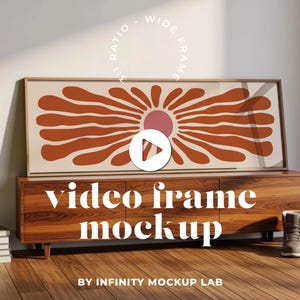 May include: A rectangular video frame mockup with a floral design in shades of orange and pink. The frame is displayed on a wooden cabinet. The text "video frame mockup" is visible. The image is labeled "BY INFINITY MOCKUP LAB."