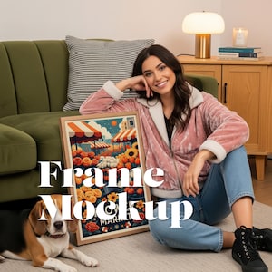 May include: A framed art print with a market scene featuring flowers and awnings. The frame is light brown. The text "Frame Mockup" is displayed in white. A dog is lying on the floor.