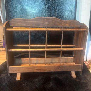 Vintage wooden magazine storage rack
