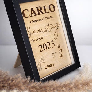 Poster personalizzato in legno con i dati di nascita del bambino: nome, data di nascita, ora e peso. Un regalo perfetto per la nascita o il battesimo.
