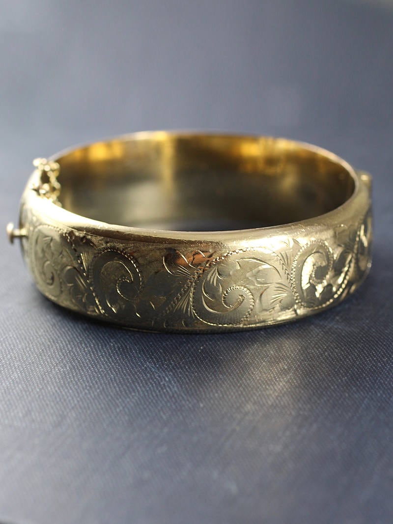Wonderfully engraved scrolling leaf pattern covers the front of this  vintage 9ct rolled gold… | Vintage jewelry, Sterling silver bracelets, Jewelry  bracelets silver