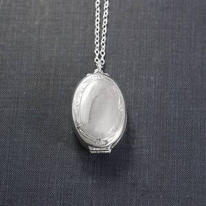 Silver family locket Clearance