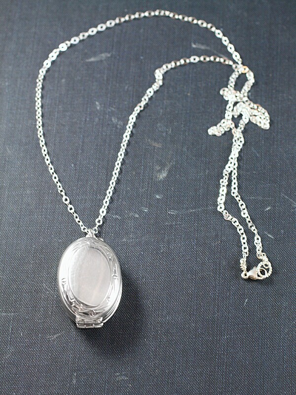 Silver family locket Clearance