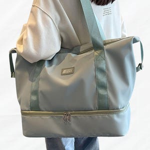 Wasserdichte Nylon Reisetasche mit mehreren Taschen: Weekender-Handtasche für Frauen