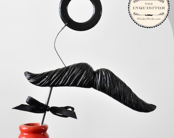 Accessoire photobooth moustache et monocle - L’Inquisiteur