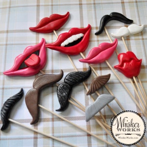 May include: A set of 10 colorful, whimsical photo booth props featuring lips and mustaches. The props are made of polymer clay and are attached to wooden sticks. The props are perfect for adding a fun and festive touch to any party or event.