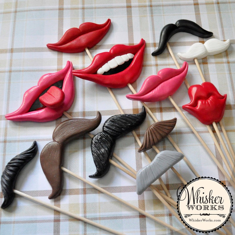 May include: A set of 10 colorful, whimsical photo booth props featuring lips and mustaches. The props are made of polymer clay and are attached to wooden sticks. The props are perfect for adding a fun and festive touch to any party or event.
