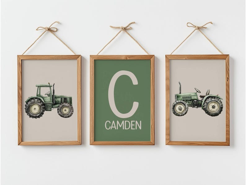 May include: Three framed prints with a farm theme. Two prints feature green tractors on a beige background. The centre print has a green background with the letter "C" and the name "CAMDEN" in white. The frames are wood.