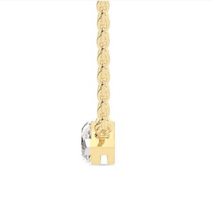 May include: A delicate gold necklace featuring a single, clear diamond pendant. The diamond is set in a square gold setting and hangs from a fine, linked gold chain. The necklace is displayed against a white background.