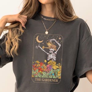 The Gardener Skeleton Shirt - Plant Lover Mom Gift - Gardening Shirt - Floral Skeleton Graphic Shirt - Plant Lady Shirt