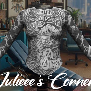 May include: A long-sleeved shirt with a black and white print featuring a cartoon duck, dollar signs, and roses. The shirt is worn by a person with tattoos on their arms.