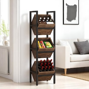 May include: A tall, dark wood and metal storage rack with three angled bins. The top bin holds bottles, the middle bin contains snacks, and the bottom bin is filled with wine bottles. The rack is in a living room setting.