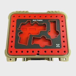 May include: Tan hard case with a red interior and black foam inserts. The interior is designed to hold a SIG P365X handgun and accessories. The text "SIG P365X" is visible on the interior. The case has a secure latching mechanism.