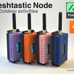 May include: Four Meshtactic Node devices for outdoor activities. The devices are in different colors: purple, orange, pink, and blue. Each device has a black antenna and a small screen.