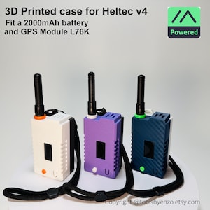 May include: Three 3D-printed cases for Heltec v4, each with a black antenna and lanyard. The cases are white, purple, and navy blue. The text on the image reads "3D Printed case for Heltec v4 Fit a 2000mAh battery and GPS Module L76K".