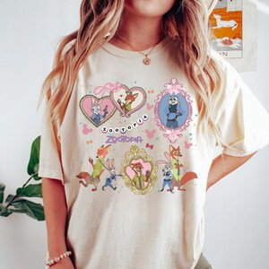 Zootopia Coquette Bow Watercolor Shirt, Judy Hopps Nick Wilde Tee, Retro Zootropolis Disney, Comfort Colors, Family Matching, WDW Trip 2025 bild 2