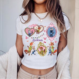 Zootopia Coquette Bow Watercolor Shirt, Judy Hopps Nick Wilde Tee, Retro Zootropolis Disney, Comfort Colors, Family Matching, WDW Trip 2025 bild 1