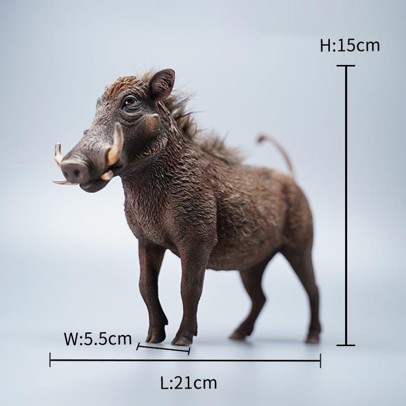 May include: A detailed figurine of a warthog, measuring 21cm long, 5.5cm wide, and 15cm high. The sculpture features a textured, brown body, prominent tusks, and a detailed face. The warthog is depicted in a standing pose.