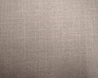 May include: A close-up of a light gray fabric with a subtle woven texture.