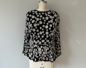 Vintage blouse met lovertjes uit de jaren 80: zijden avondtop met cirkelpatroon, maat S/M