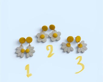 Bonitos pendientes florales hechos a mano.